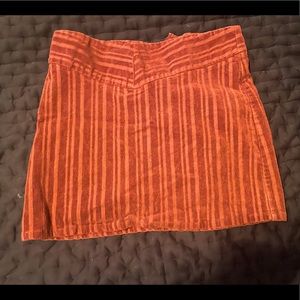 Orangey red mini skirt